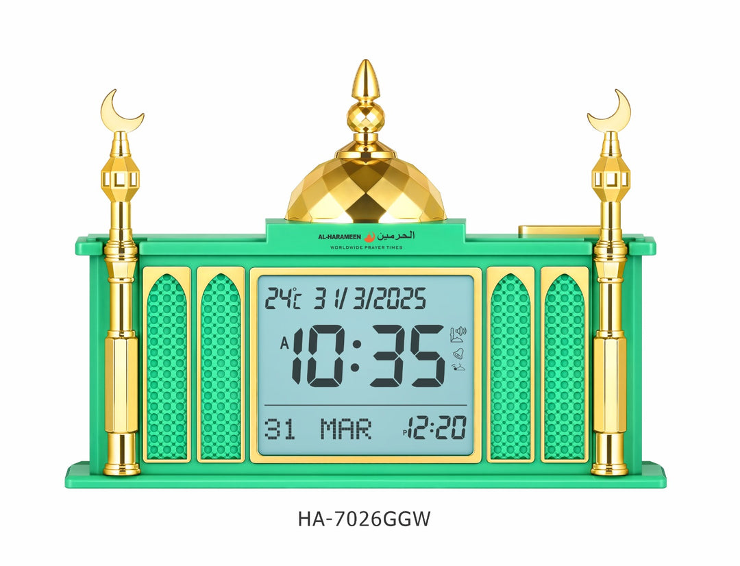 HA-7026GGW harameen azan clock Green and gold digital clock with prayer time display on a white background
