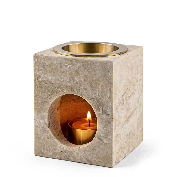 Aroma Tierra Odyssey Travertine Stone essential oil diffuser, candle burner, carved from a solid piece of travertine limestone, a stone whose history dates back to Roman times.
