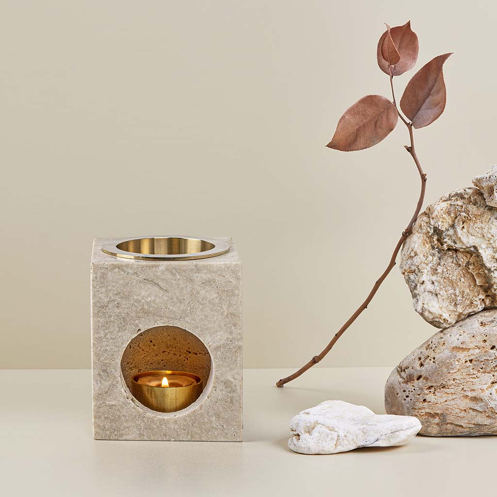 Aroma Tierra  Odyssey  made of Travertine Stone diffuser  with attractive earth-tone colors, unique textures, and urbane brass oil dish
