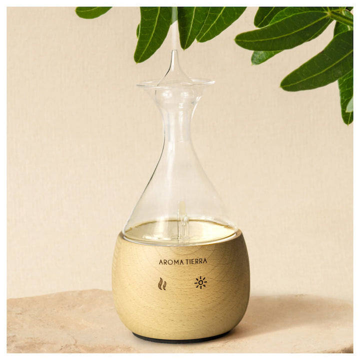 Aroma Tierra Eternal essential oil nebulizer waterless diffuser  made of natural wood and handblown glass.