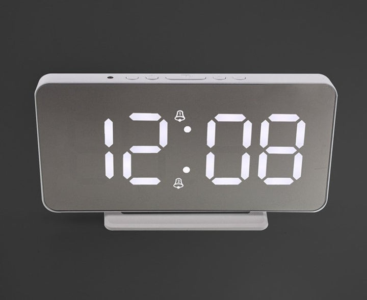 Buy 0S-002 LED Mirror Alarm Clock at deensquare.com Dubai | UAE. Displays time, date, temperature &amp; dual alarms with stylish mirror design.