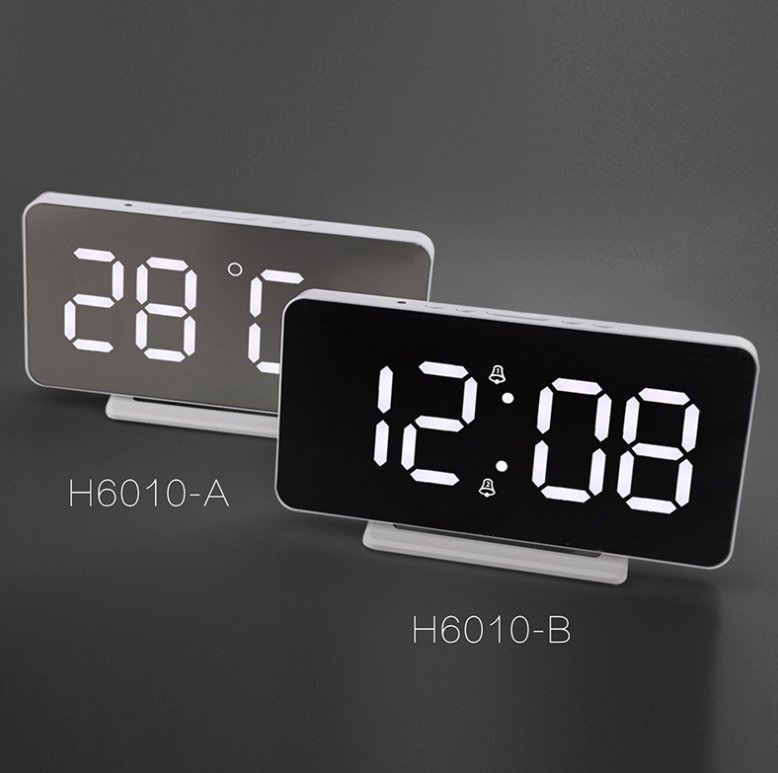Buy 0S-002 LED Mirror Alarm Clock at deensquare.com Dubai | UAE. Displays time, date, temperature &amp; dual alarms with stylish mirror design.