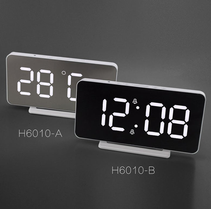 Buy 0S-002 LED Mirror Alarm Clock at deensquare.com Dubai | UAE. Displays time, date, temperature &amp; dual alarms with stylish mirror design.
