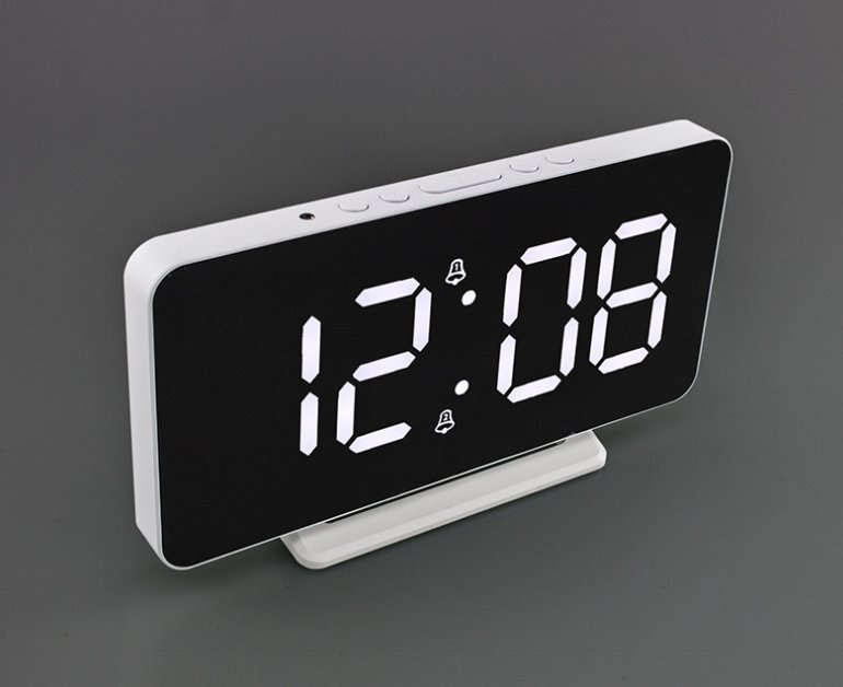 Buy 0S-002 LED Mirror Alarm Clock at deensquare.com Dubai | UAE. Displays time, date, temperature &amp; dual alarms with stylish mirror design.
