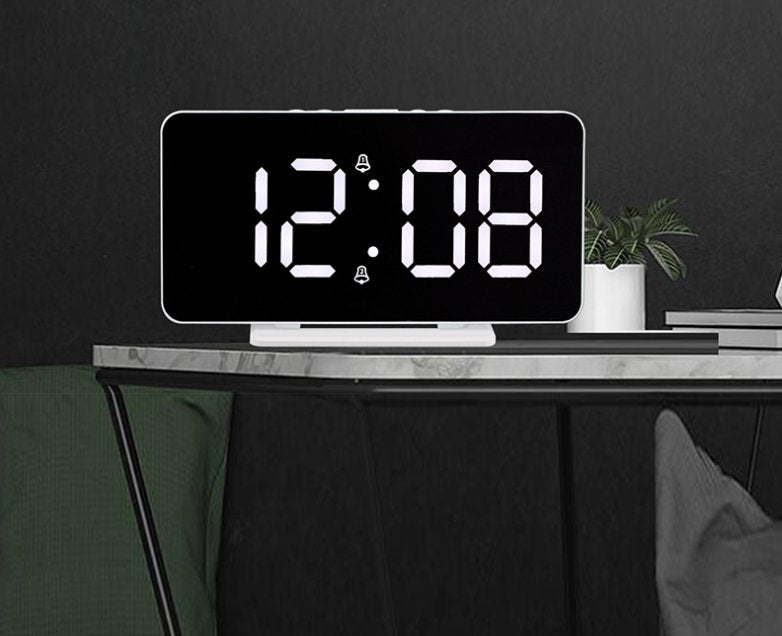 Buy 0S-002 LED Mirror Alarm Clock at deensquare.com Dubai | UAE. Displays time, date, temperature &amp; dual alarms with stylish mirror design.