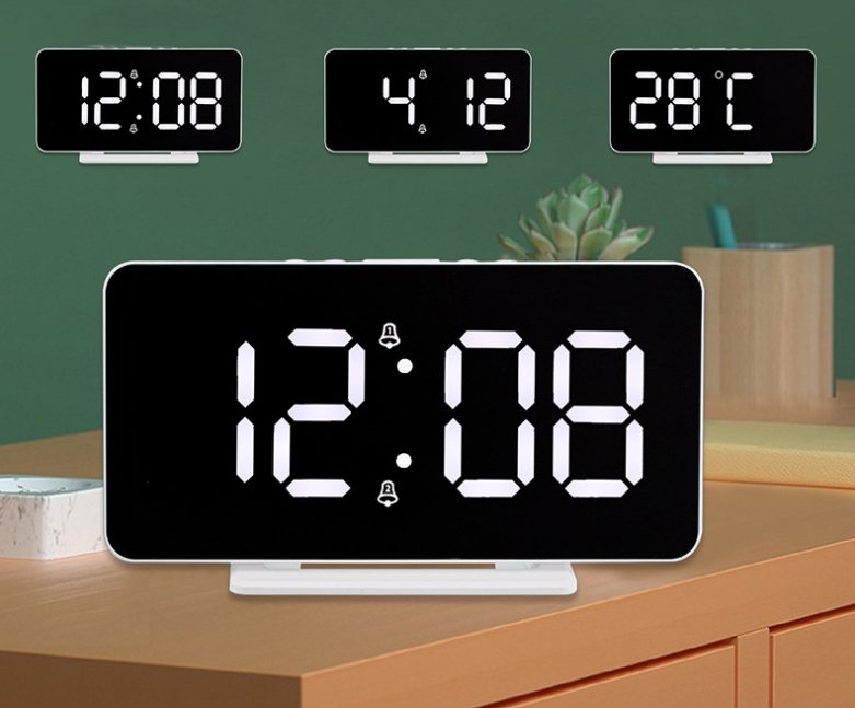Buy 0S-002 LED Mirror Alarm Clock at deensquare.com Dubai | UAE. Displays time, date, temperature &amp; dual alarms with stylish mirror design.