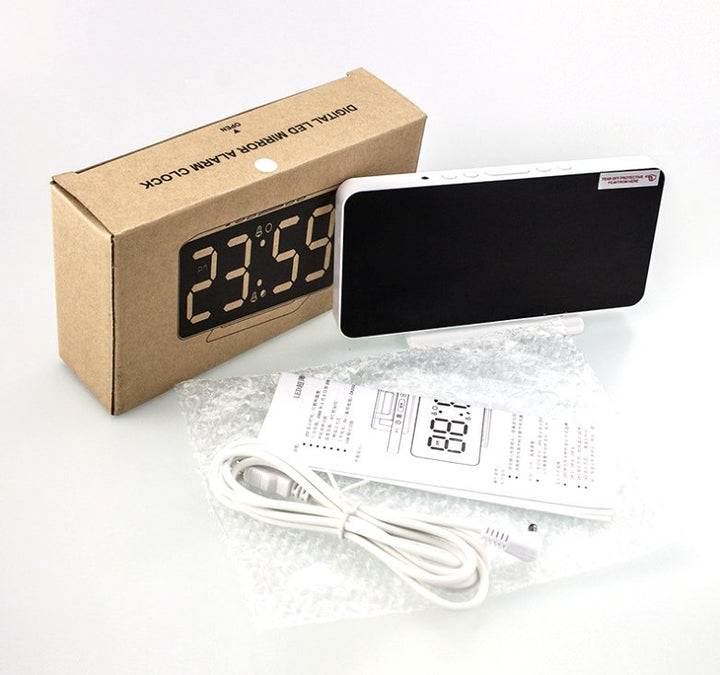 Buy 0S-002 LED Mirror Alarm Clock at deensquare.com Dubai | UAE. Displays time, date, temperature &amp; dual alarms with stylish mirror design.