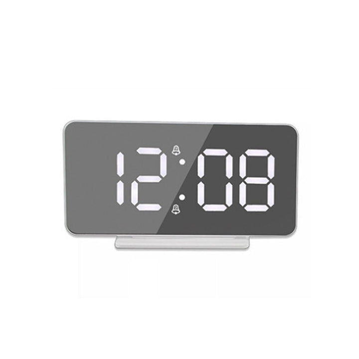 Buy 0S-002 LED Mirror Alarm Clock at deensquare.com Dubai | UAE. Displays time, date, temperature &amp; dual alarms with stylish mirror design.