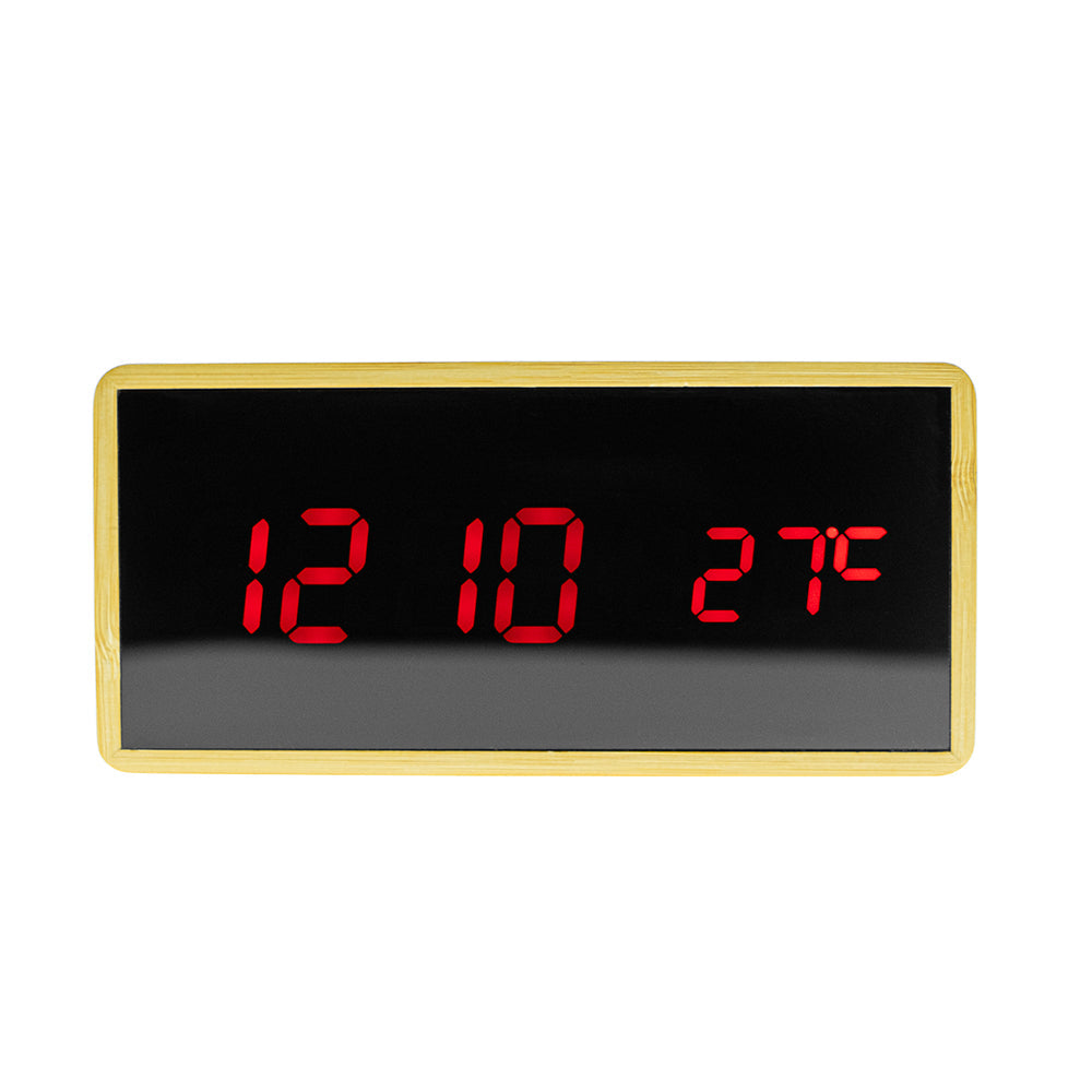 Buy Model 1299 Wooden Clock at deensquare.com Dubai | UAE. Features Bluetooth speaker, wireless charging, alarm clock, temperature &amp; humidity display.