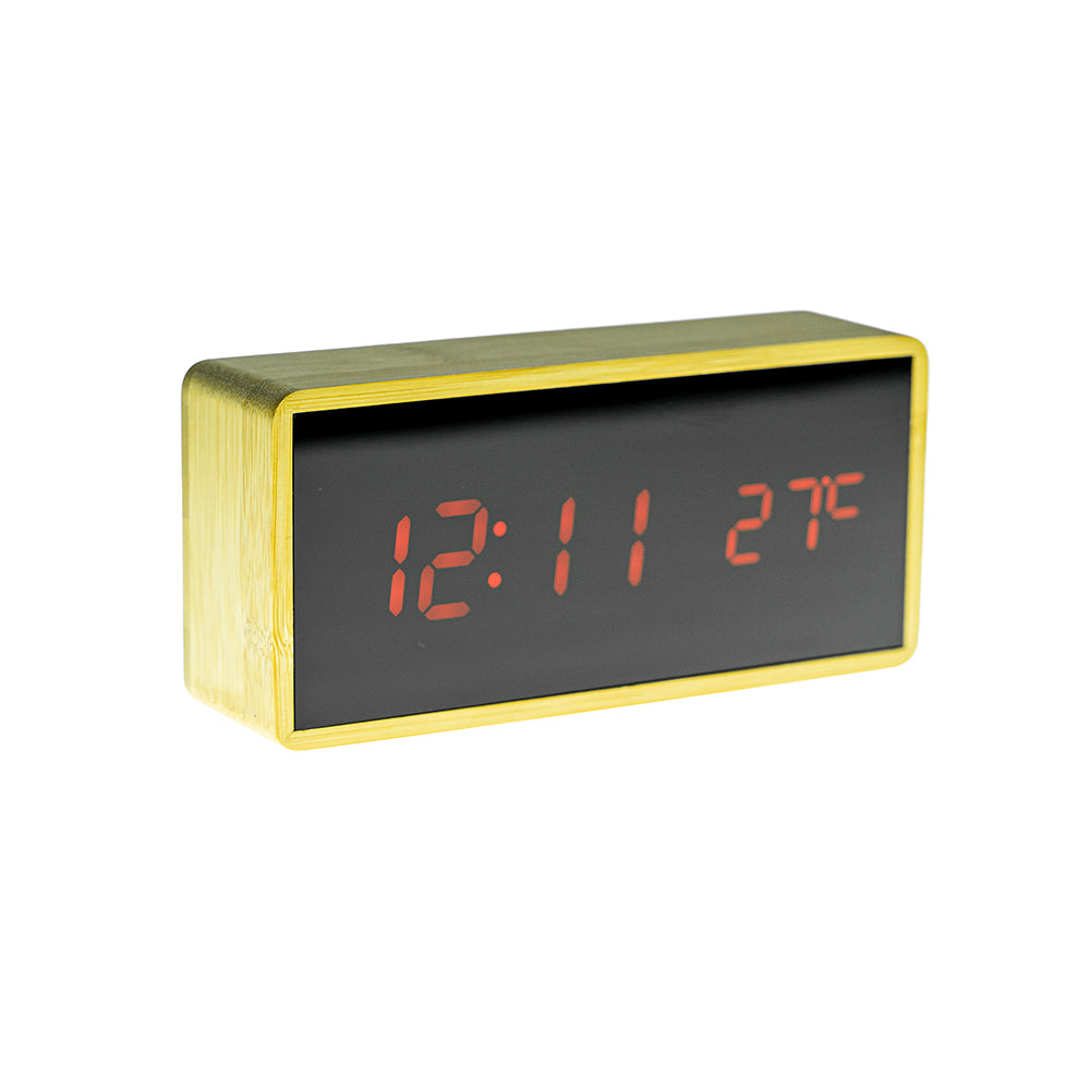 Buy Model 1299 Wooden Clock at deensquare.com Dubai | UAE. Features Bluetooth speaker, wireless charging, alarm clock, temperature &amp; humidity display.