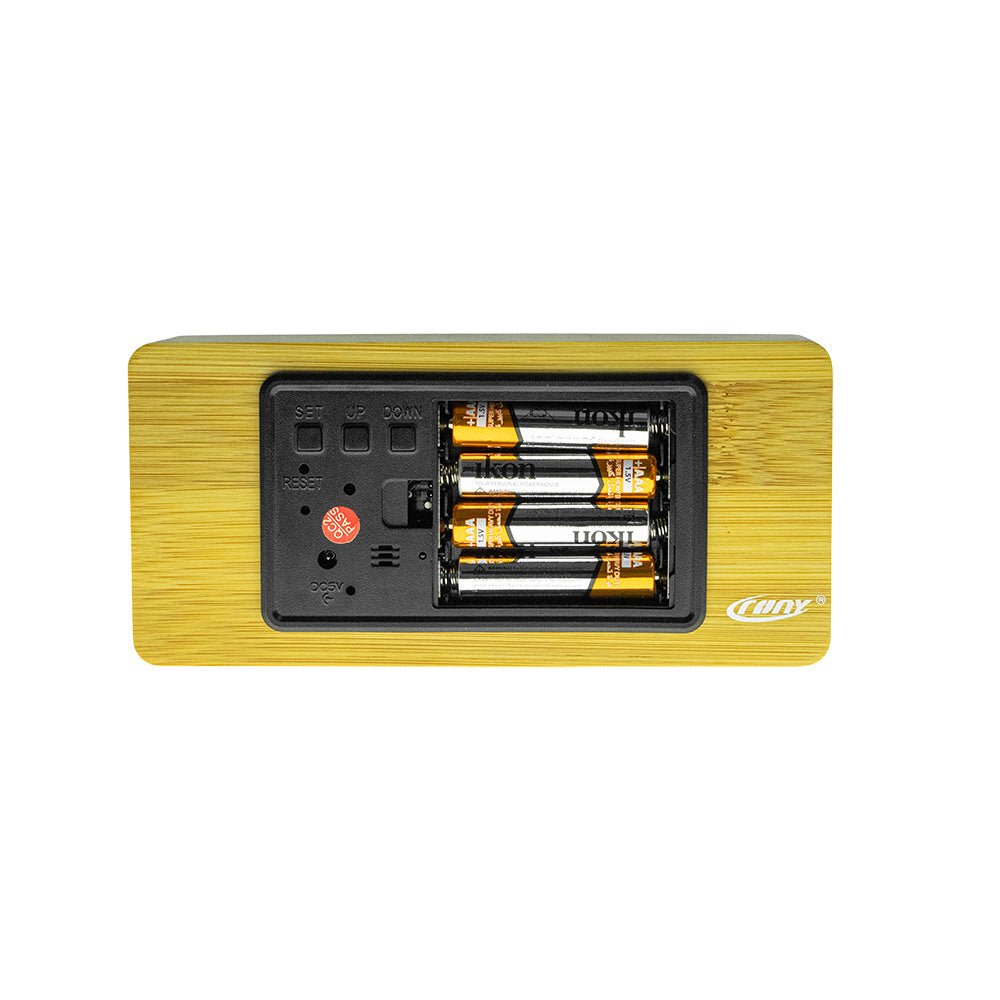 Buy Model 1299 Wooden Clock at deensquare.com Dubai | UAE. Features Bluetooth speaker, wireless charging, alarm clock, temperature &amp; humidity display.