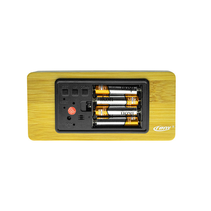 Buy Model 1299 Wooden Clock at deensquare.com Dubai | UAE. Features Bluetooth speaker, wireless charging, alarm clock, temperature &amp; humidity display.