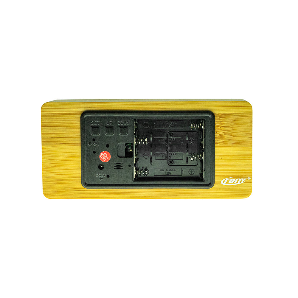 Buy Model 1299 Wooden Clock at deensquare.com Dubai | UAE. Features Bluetooth speaker, wireless charging, alarm clock, temperature &amp; humidity display.