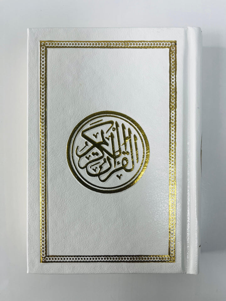 Buy 15-Line Uthmani Quran at deensquare.com | Dubai | UAE. Compact 8×12 cm Mushaf with cream pages and white art cover for reading and travel.