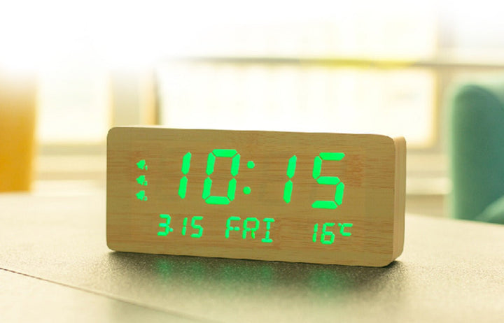Buy 1501 wooden clock with perpetual calendar at deensquare.com. LED alarm clock with temperature display in Dubai | UAE.