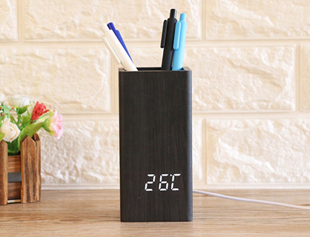 Buy Wooden Pen Holder Alarm Clock Model 2020 at deensquare.com Dubai | UAE. Features clock, calendar, temperature display &amp; desk organizer.