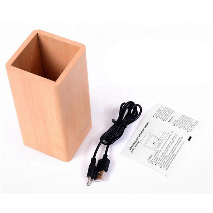 Buy Wooden Pen Holder Alarm Clock Model 2020 at deensquare.com Dubai | UAE. Features clock, calendar, temperature display &amp; desk organizer.