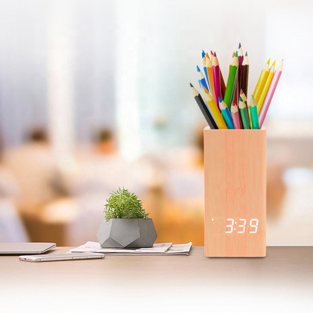 Buy Wooden Pen Holder Alarm Clock Model 2020 at deensquare.com Dubai | UAE. Features clock, calendar, temperature display &amp; desk organizer.