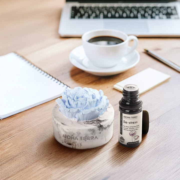 cera flora aroma diffuser with de-stress essential oil on work desk
