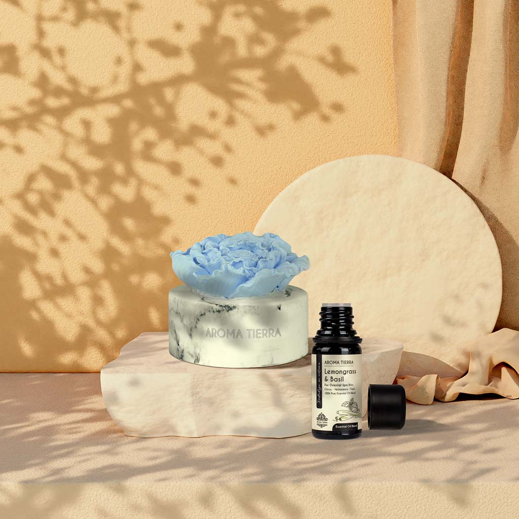 cera flora blue flower ceramic diffuser with lemongrass &amp; basil oil in sunlit room