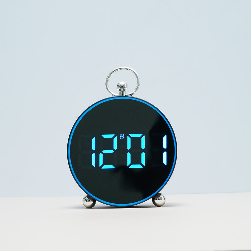 Buy 8025 Voice Activated LED Alarm Clock at deensquare.com Dubai | UAE. Digital clock with date, temperature, snooze & atmosphere light.