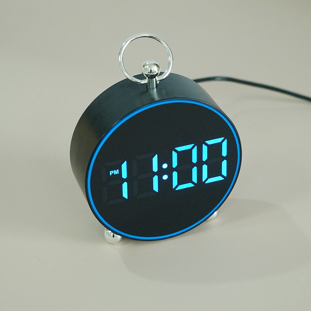 Buy 8025 Voice Activated LED Alarm Clock at deensquare.com Dubai | UAE. Digital clock with date, temperature, snooze &amp; atmosphere light.
