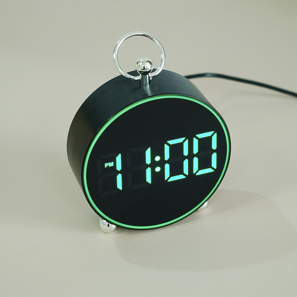 Buy 8025 Voice Activated LED Alarm Clock at deensquare.com Dubai | UAE. Digital clock with date, temperature, snooze &amp; atmosphere light.