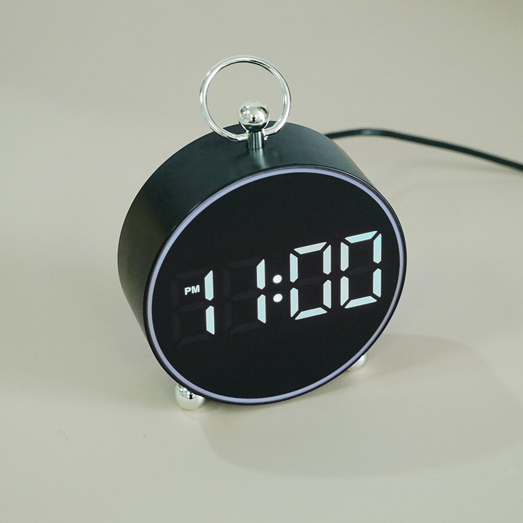 Buy 8025 Voice Activated LED Alarm Clock at deensquare.com Dubai | UAE. Digital clock with date, temperature, snooze &amp; atmosphere light.