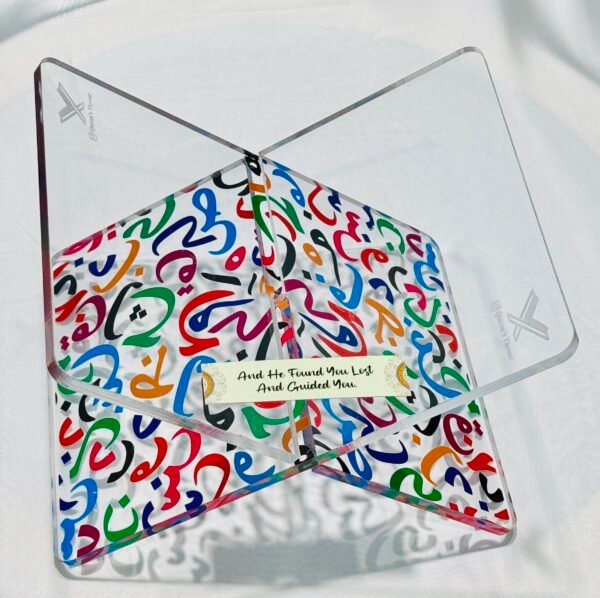 Elegant acrylic Quran stand made from 8mm acrylic with UV printed multi-color Arabic alphabets. Durable, stylish, and ideal for home, mosque, and gifting.