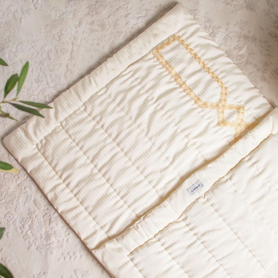 Buy DAMAC handmade embroidery prayer mat at deensquare.com. Premium Jodali sajjadah in acrylic box with fast shipping in Dubai | UAE.