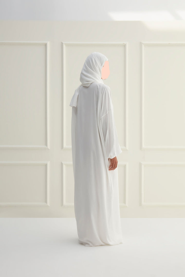 Buy Jodali off white prayer dress with attached sheila. Fast shipping in Dubai and delivery across UAE from DeenSquare.com.