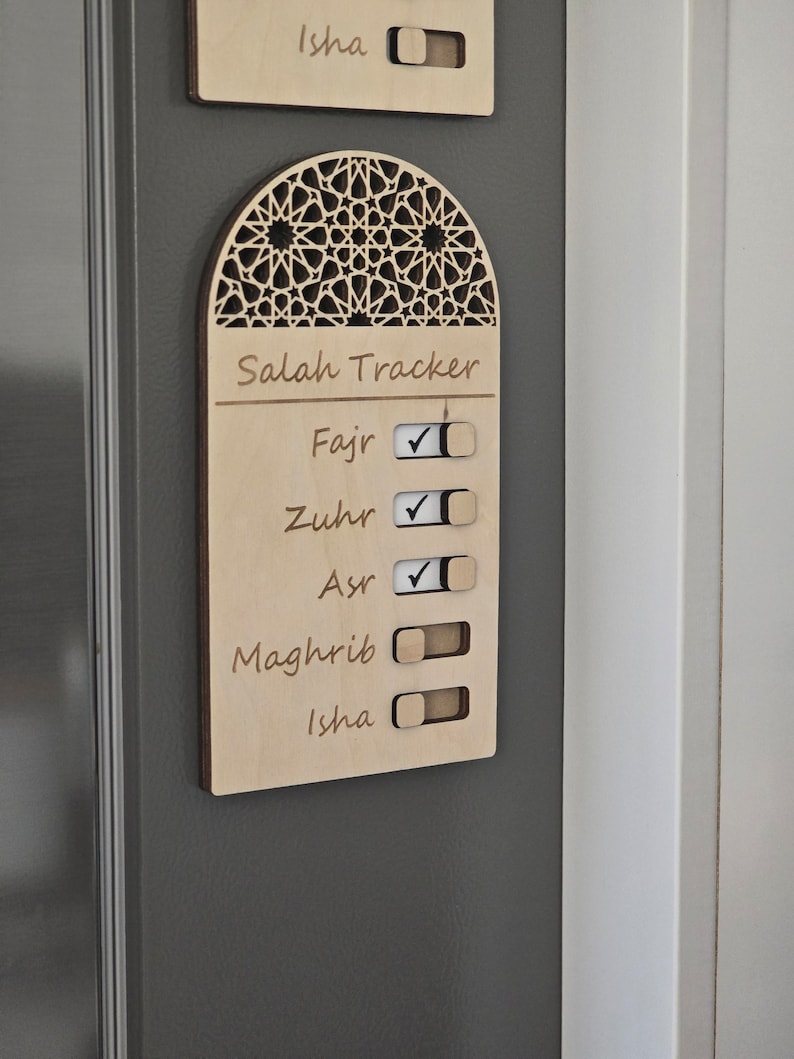 Wooden magnetic Salah tracker with toggle switches to track daily prayers. Perfect for kids and adults to build a consistent prayer habit.