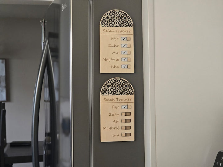 Wooden magnetic Salah tracker with toggle switches to track daily prayers. Perfect for kids and adults to build a consistent prayer habit.
