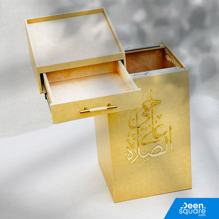 Organize your prayer essentials with this elegant PU leather decorative box. Features top Quran space, a drawer for Tasbeeh, and ample storage for mats and dresses.