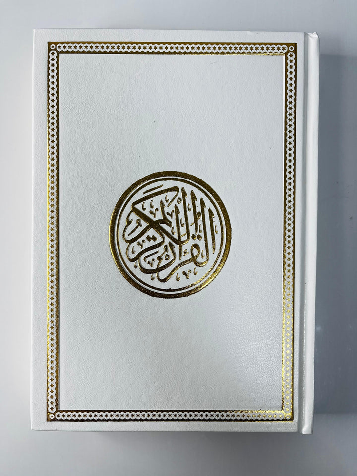 Buy Quran Uthmani Script with 15 lines, cream pages &amp; white art cover at deensquare.com. 17x24cm. Dubai | UAE. Worldwide shipping.
