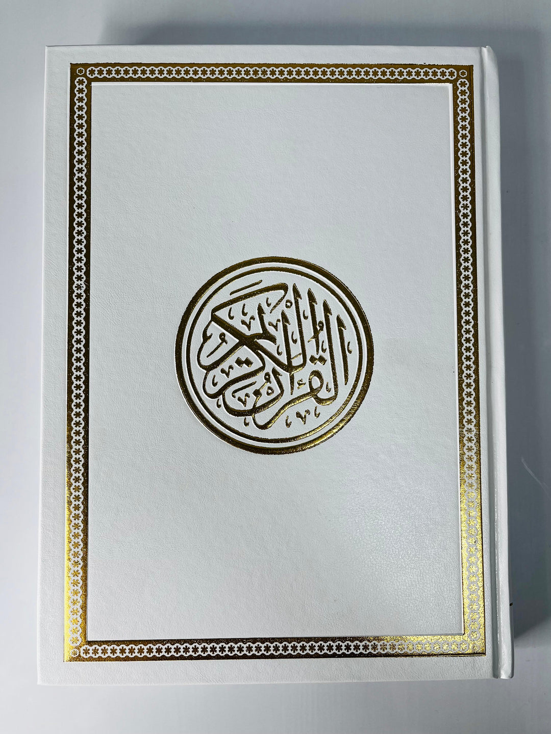 Buy Quran Uthmani Script with 15 lines, white pages &amp; art cover at deensquare.com. 20x28cm. Dubai | UAE. Worldwide shipping available.