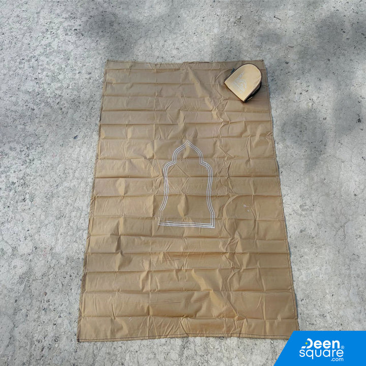Lightweight waterproof travel prayer mat (70×115 cm). Foldable, compact, and perfect for travel, work, and outdoor use.