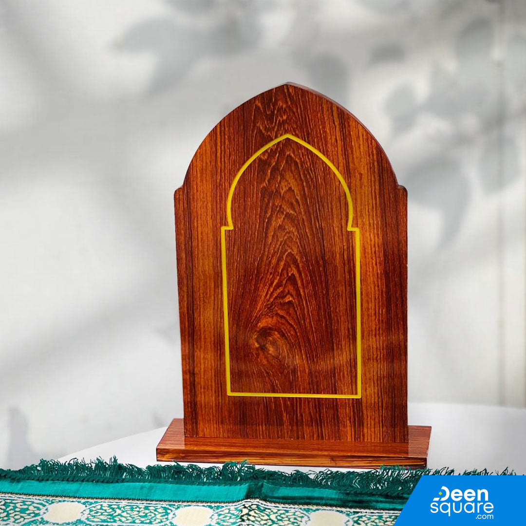 The Wooden Sutrah for Prayers (10×16 inches) is a practical and Sunnah-based prayer accessory placed in front of the person performing Salah. Using a sutrah helps maintain focus, prevents people from crossing directly in front, and supports proper prayer etiquette.

Crafted from durable wooden material, this sutrah features a balanced size of 10×16 inches, offering better visibility while remaining lightweight and easy to use. Its simple and elegant design makes it suitable for home prayers, masjids, office