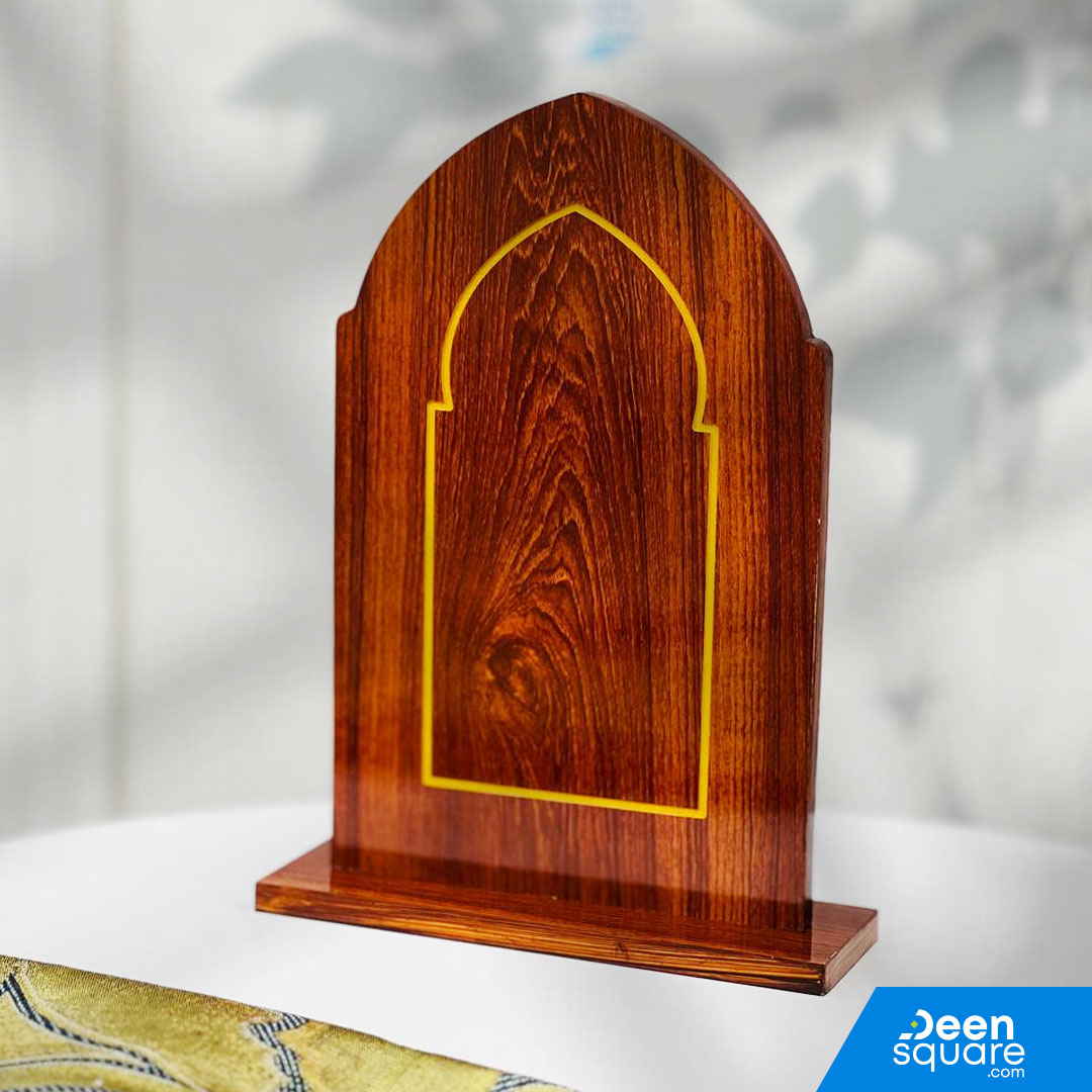The Wooden Sutrah for Prayers (10×16 inches) is a practical and Sunnah-based prayer accessory placed in front of the person performing Salah. Using a sutrah helps maintain focus, prevents people from crossing directly in front, and supports proper prayer etiquette.

Crafted from durable wooden material, this sutrah features a balanced size of 10×16 inches, offering better visibility while remaining lightweight and easy to use. Its simple and elegant design makes it suitable for home prayers, masjids, office
