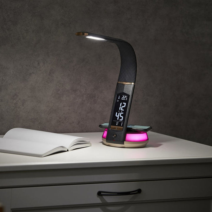 Buy B22D LED Table Lamp with Wireless Charging at deensquare.com Dubai | UAE. Features clock, temperature display, mood light &amp; pen holder.