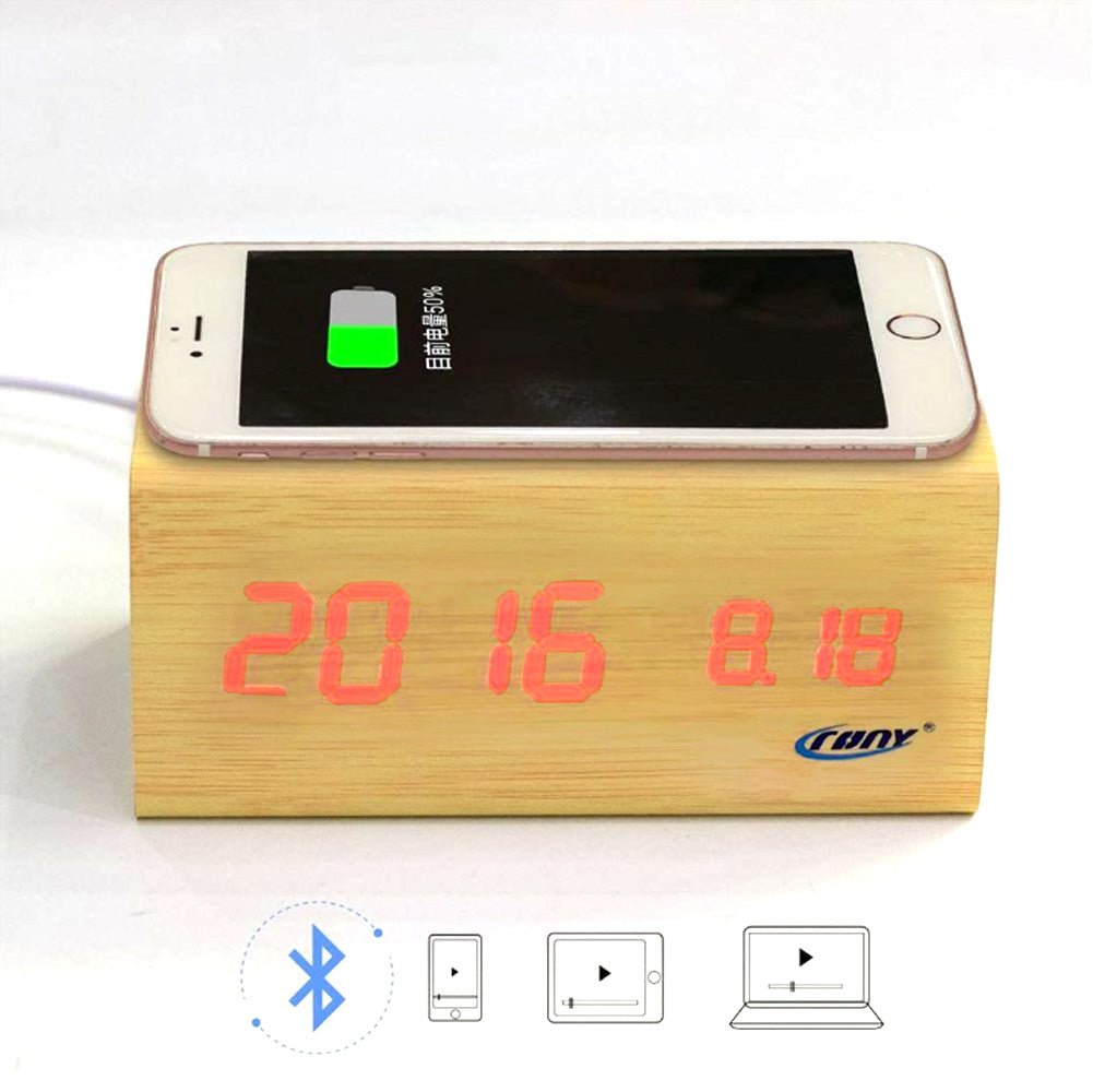 Buy CN1299 Wooden LED Clock with Bluetooth Speaker &amp; Wireless Charging at deensquare.com Dubai | UAE. Alarm, temperature &amp; humidity display.