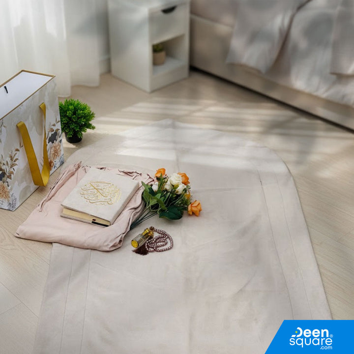 A premium Islamic gift set for women featuring a Qur’an, prayer mat, prayer dress, attar, tasbeeh, and elegant gift box. Perfect for weddings & Eid. Shipping Worldwide & across Dubai, Sharjah, Abu Dhabi, UAE