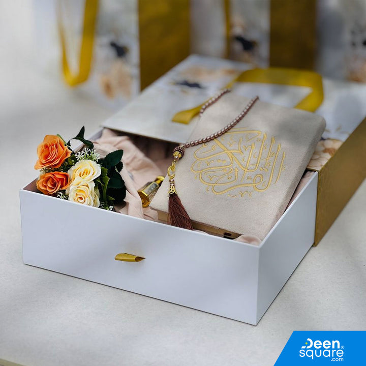 A premium Islamic gift set for women featuring a Qur’an, prayer mat, prayer dress, attar, tasbeeh, and elegant gift box. Perfect for weddings & Eid. Shipping Worldwide & across Dubai, Sharjah, Abu Dhabi, UAE