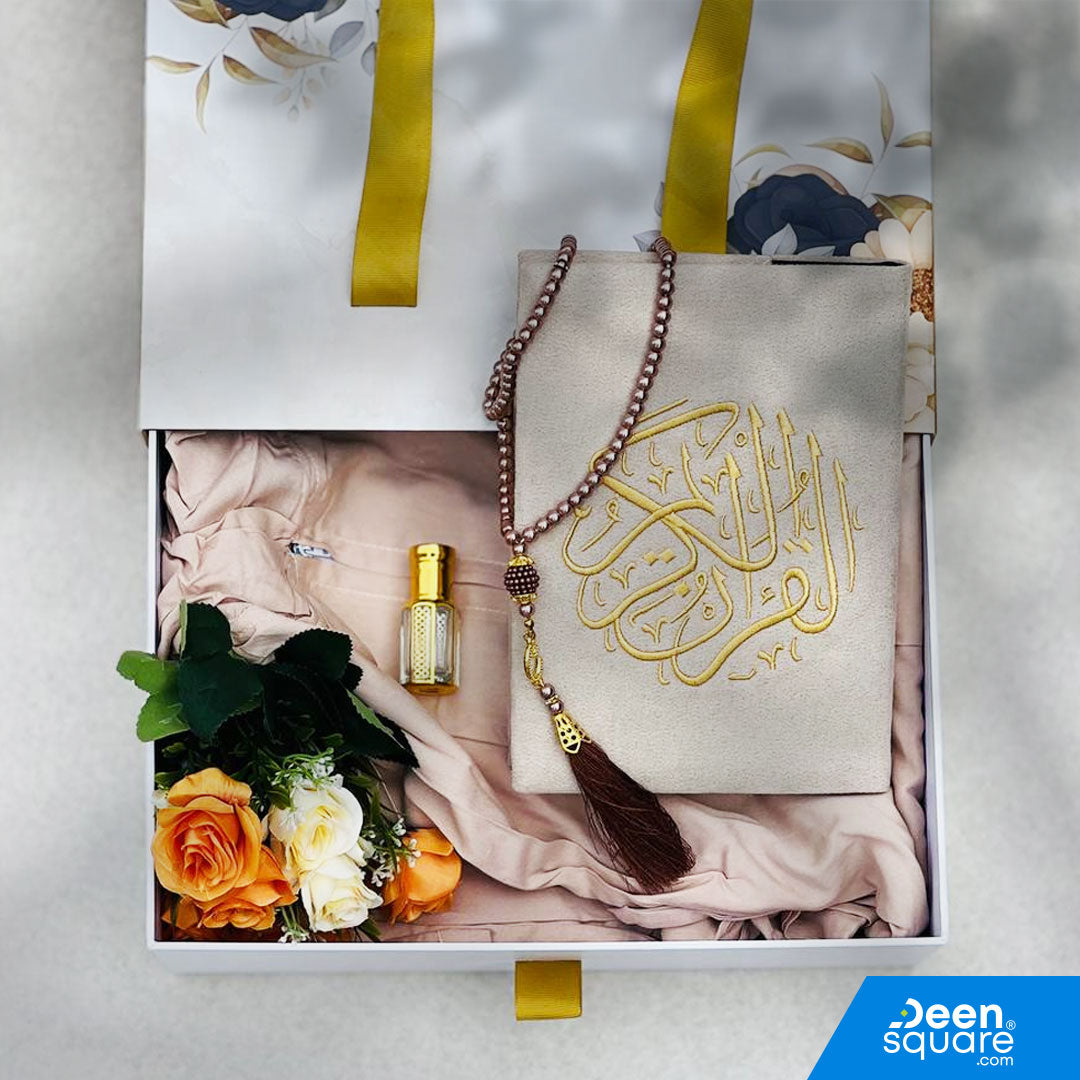 A premium Islamic gift set for women featuring a Qur’an, prayer mat, prayer dress, attar, tasbeeh, and elegant gift box. Perfect for weddings & Eid. Shipping Worldwide & across Dubai, Sharjah, Abu Dhabi, UAE