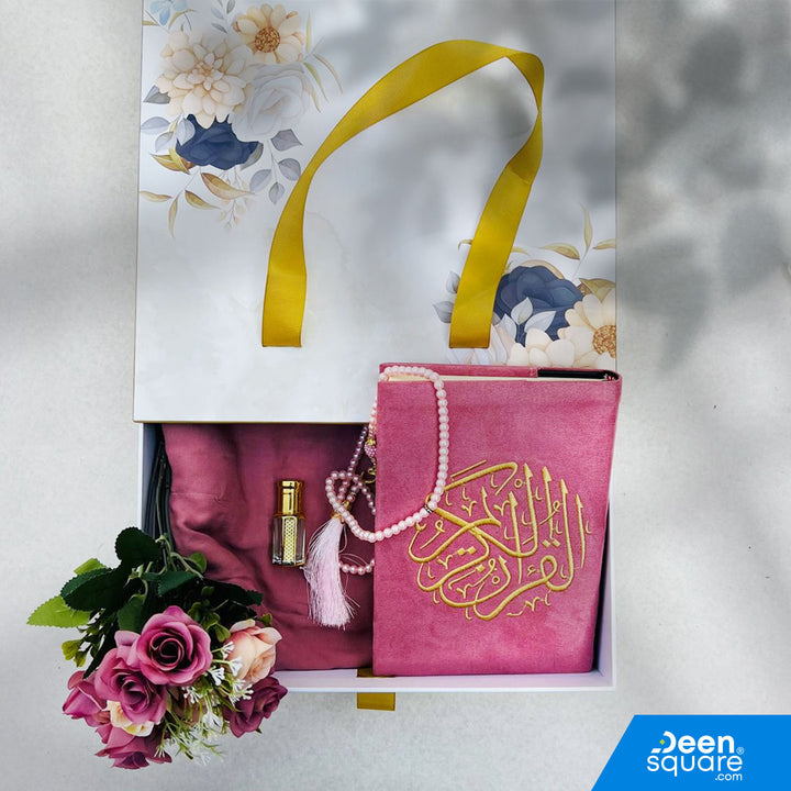 A premium Islamic gift set for women featuring a Qur’an, prayer mat, prayer dress, attar, tasbeeh, and elegant gift box. Perfect for weddings & Eid. Shipping Worldwide & across Dubai, Sharjah, Abu Dhabi, UAE