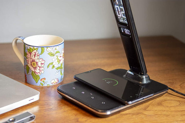 Buy U13Q LED Desk Lamp with Wireless Charger at deensquare.com Dubai | UAE. Features clock, calendar, alarm, temperature display &amp; 3 light modes.