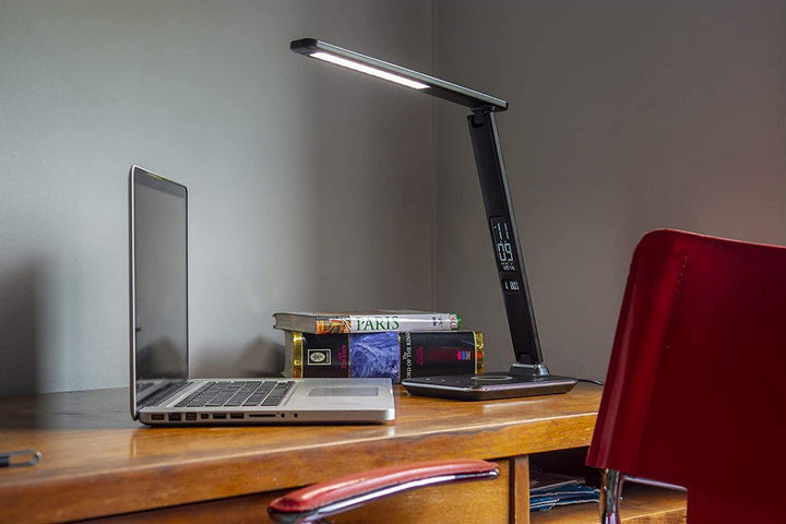 Buy U13Q LED Desk Lamp with Wireless Charger at deensquare.com Dubai | UAE. Features clock, calendar, alarm, temperature display &amp; 3 light modes.