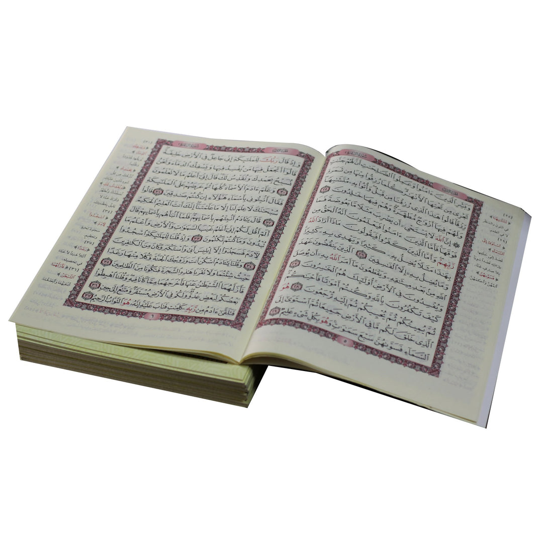 Qur'an in 30 Juzz in a leather case (25x35 cm) - القرآن الكريم في ٣٠ جزء لحفظ القرآن الكريم في حقيبة جلدية