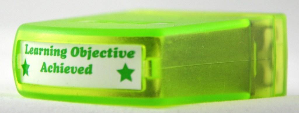 Learning Objective Achieved Stamp (Green)